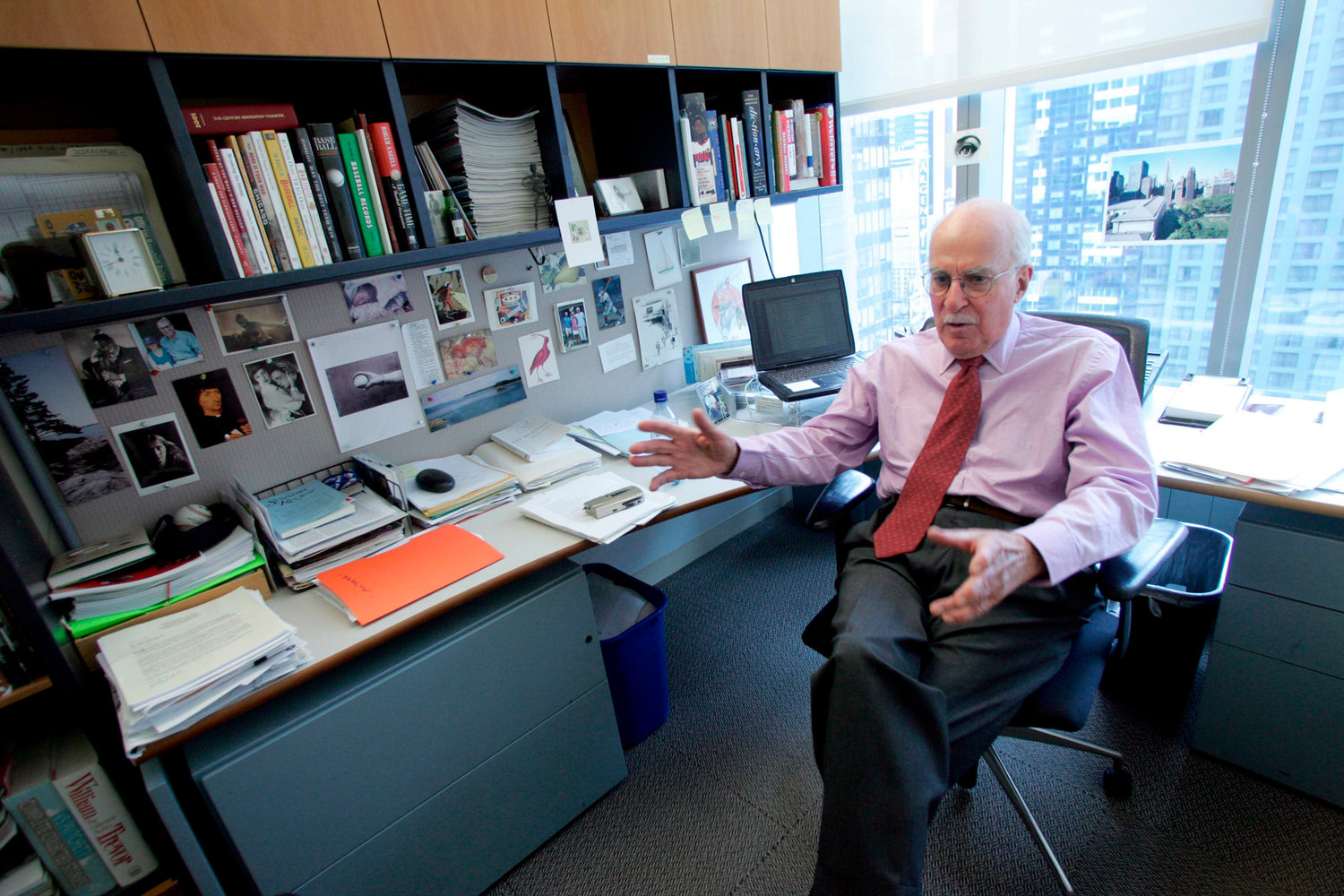Author Roger Angell gestures during an interview at his office at the New Yorker magazine on April 4, 2006, in New York. Angell, a longtime New Yorker writer and editor, has died the New Yorker announced Friday, May 20, 2022. He was 101. Angell, the son of founding New Yorker editor Katharine White and stepson of E.B. White, contributed hundreds of essays and stories to the magazine over a 70-year career. (AP Photo/Mary Altaffer, File)