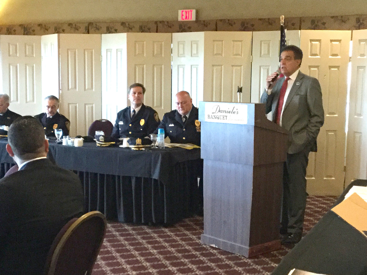 Utica Mayor Robert Palmieri shares a few encouraging words for the police officers being honored at the awards ceremony on Thursday at Daniele’s at Valley View on the Memorial Parkway. Being an officer, Palmieri said, is difficult job.