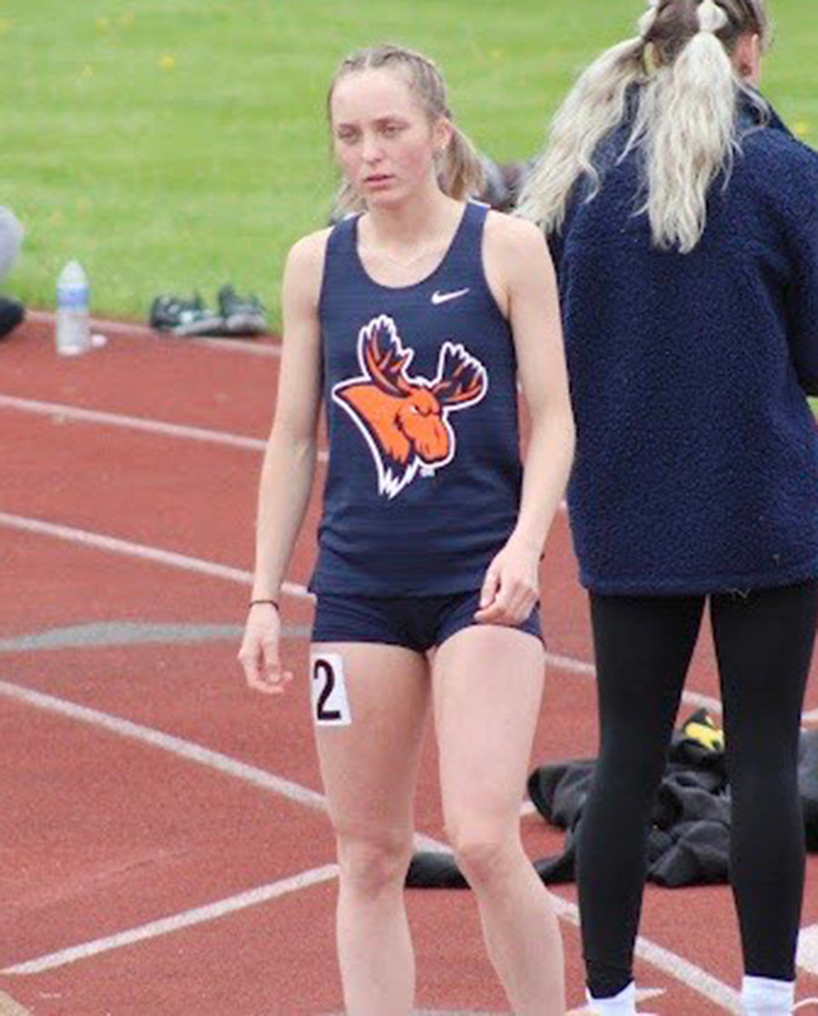 Utica University freshman Mackenzie Mix is pictured before the 100-meter dash at the Empire 8 Championships.