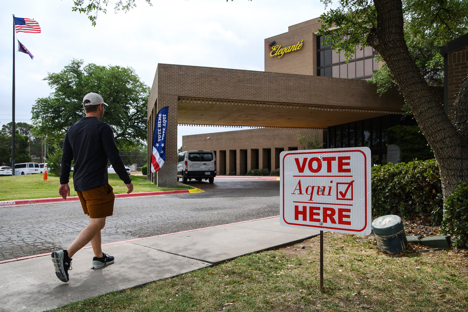 Voter Austin Hall walks into a polling location to cast his vote in the joint primary runoff election, Tuesday, May 24, 2022, in Odessa, Texas. (Eli Hartman/Odessa American via AP)