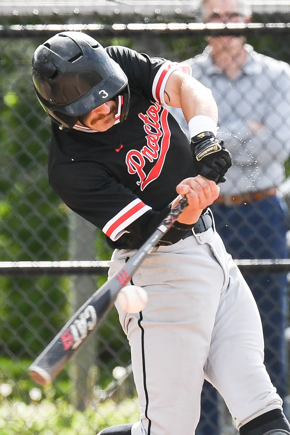 Proctor batter Todd Abraham swings at a pitch during the Section III Class A playoff game against Fayetteville-Manlius on Tuesday at Murnane Field in Utica. Abraham had two hits, a run and an RBI in the team's 5-4 loss in eight innings.