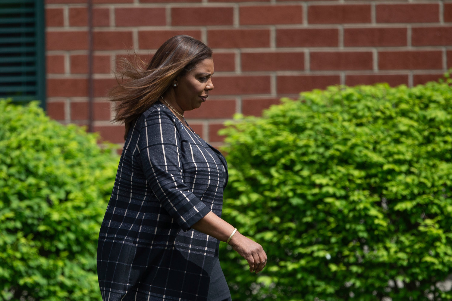 New York Attorney General Letitia James walks to a funeral service for Aaron Salter Jr. at The Chapel at Crosspoint on Wednesday, May 25, 2022, in Getzville, N.Y. Salter Jr. was killed in the Buffalo supermarket shooting on May 14. (AP Photo/Joshua Bessex)