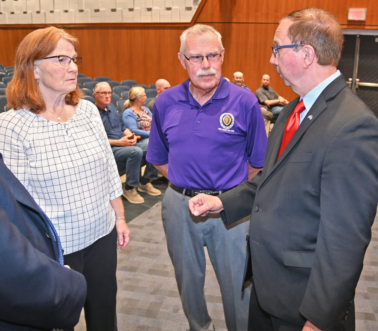 Sen. Joseph Griffo talks with Donna Parker and Renny Parker the Veterans Hall of Fame inductee Wednesday afternoon at Camden HS.