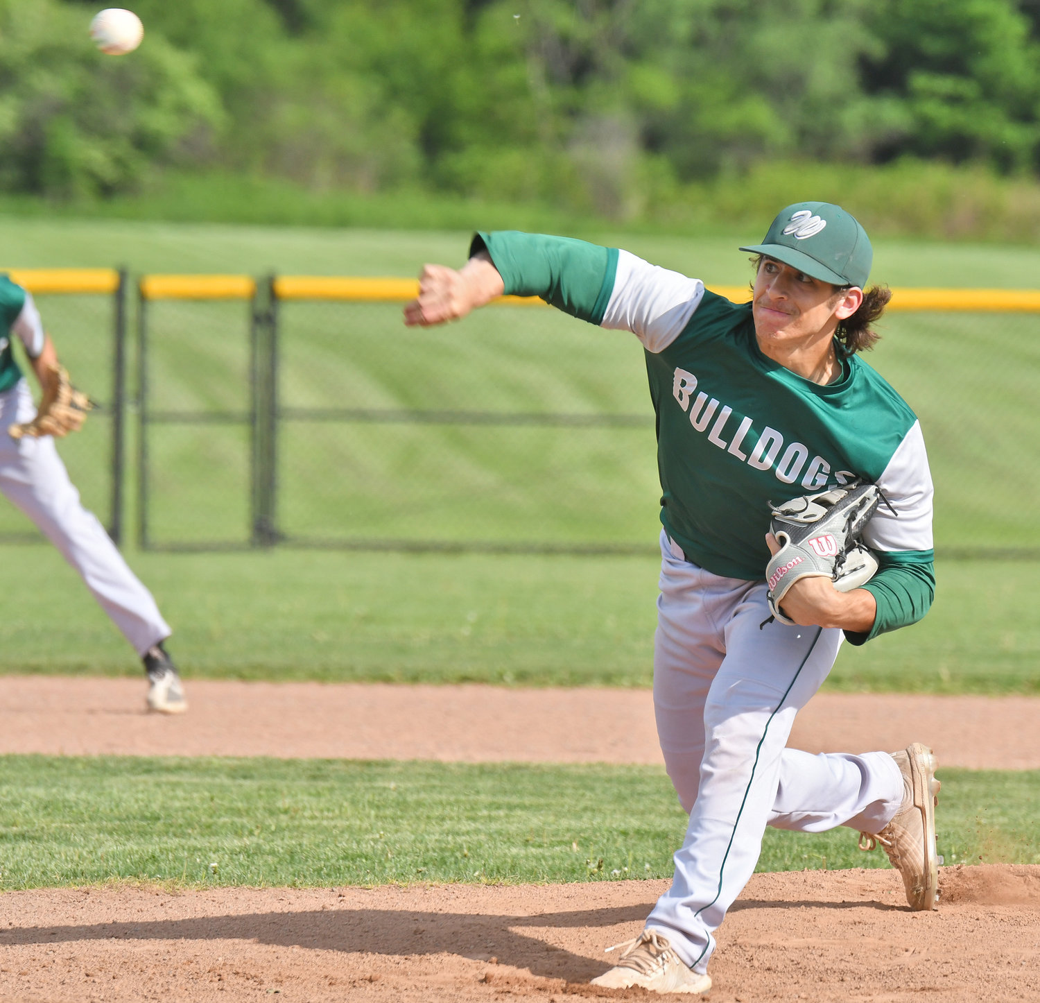 Westmoreland’s Caleb Miller delivers a pitch in the first inning of Tuesday’s 18-1 win at home against Alexandria in the second round of the Section III Class C postseason. Miller earned the win as the top-seeded Bulldogs remained unbeaten this season.