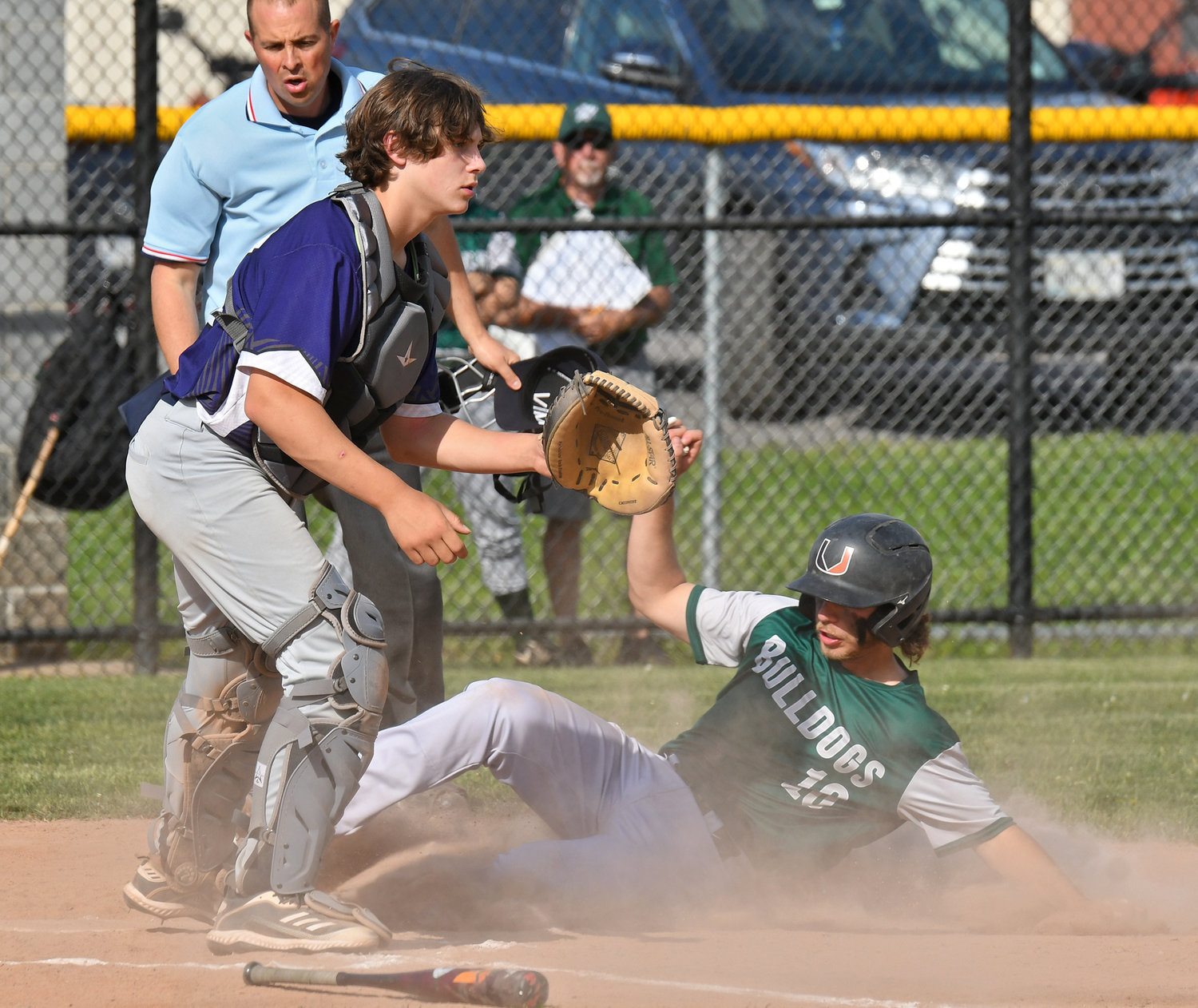Westmoreland baserunner Michael Scalise slides safely into home at home Tuesday against Alexandria in the second round of the Section III Class C baseball playoffs. The top-seeded Bulldogs won 18-1 in a game called after five innings due to the mercy rule. Westmoreland is now 17-0 this season.