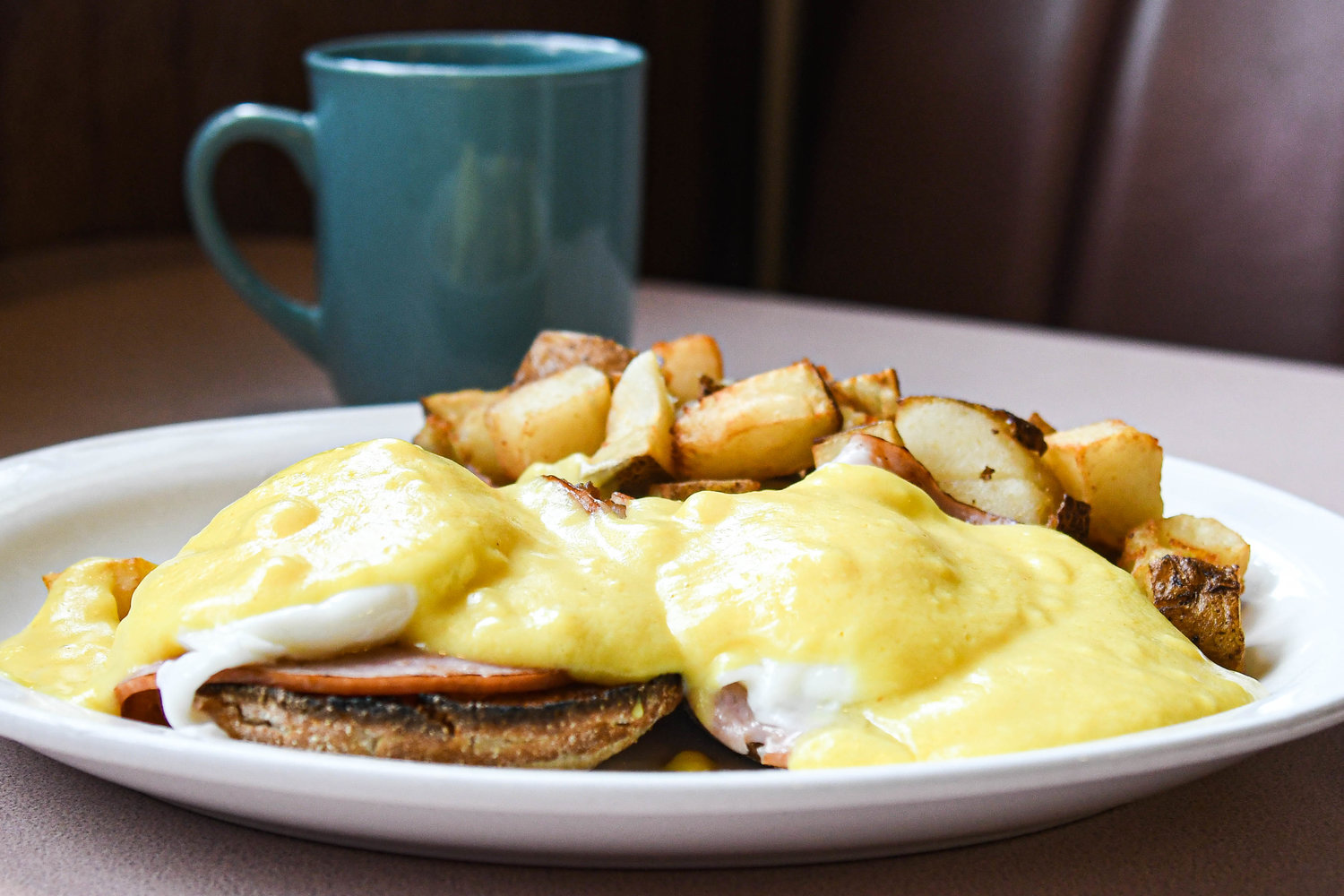 Eggs Benedict with home fries from Charlie’s Place in Clinton.