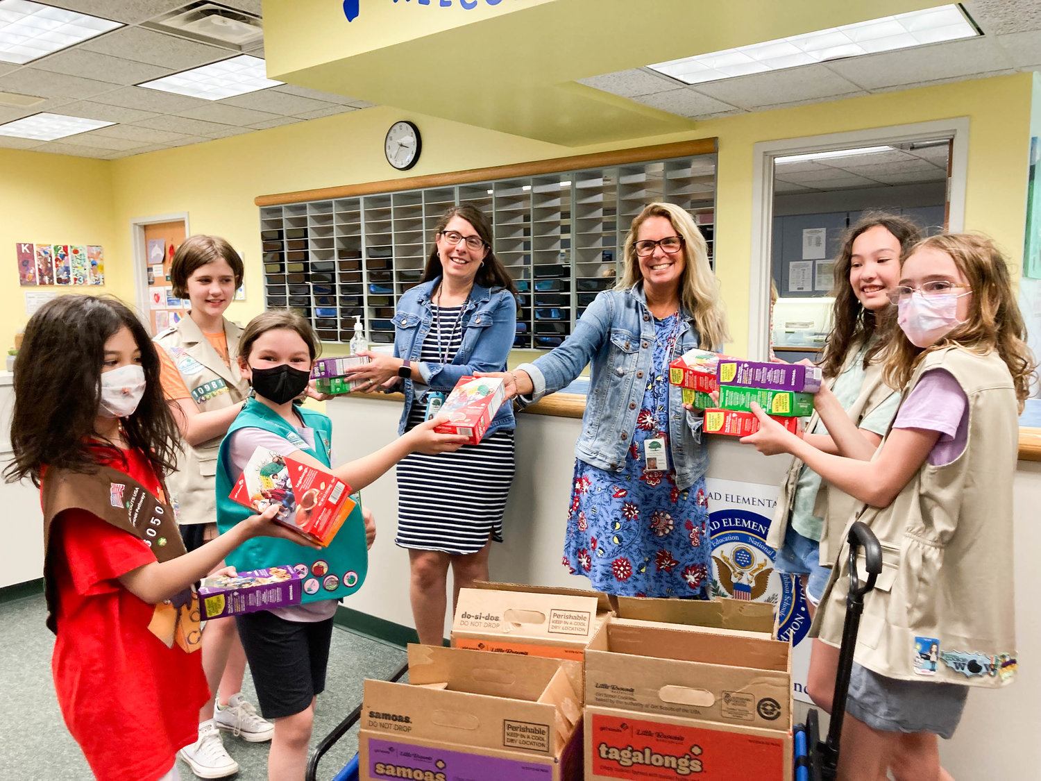 GSNYPENN Girl Scouts from Fayetteville-Manlius schools (Onondaga County) recently presented cookies donated through the 2022 Sweet Support Gift of Caring service project to faculty and staff at Enders Road Elementary in Manlius.