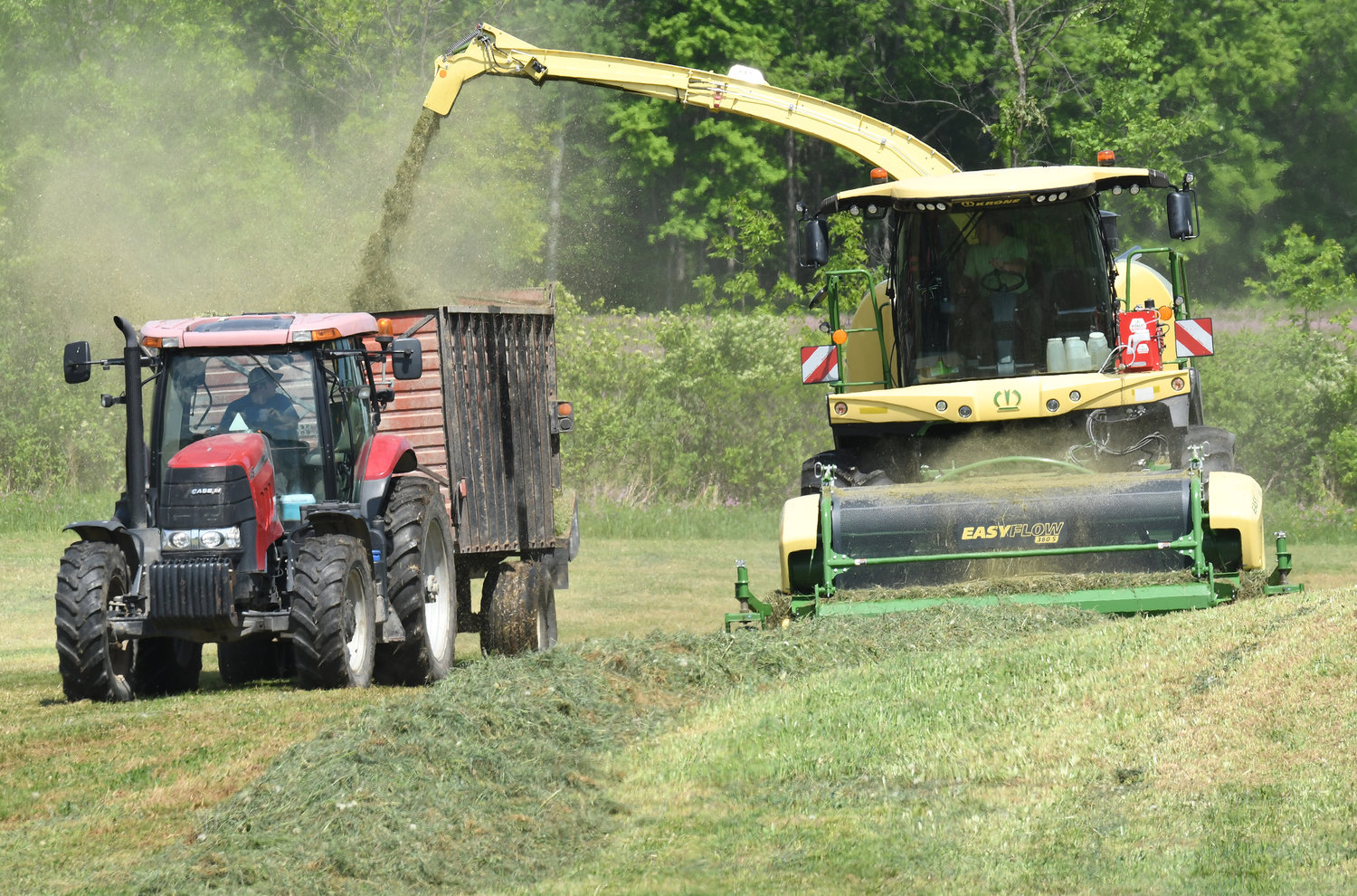 Farmers from Brabant Farms in Verona, a past host of the annual Farm Fest, get the season’s  first cutting of grass/alfalfa as they work in a field off Route 49 in New London. Area residents will have a chance to learn all about farm life as the popular event will be held on Friday at DiNitto Farms, 6586 Benton Road in Marcy.