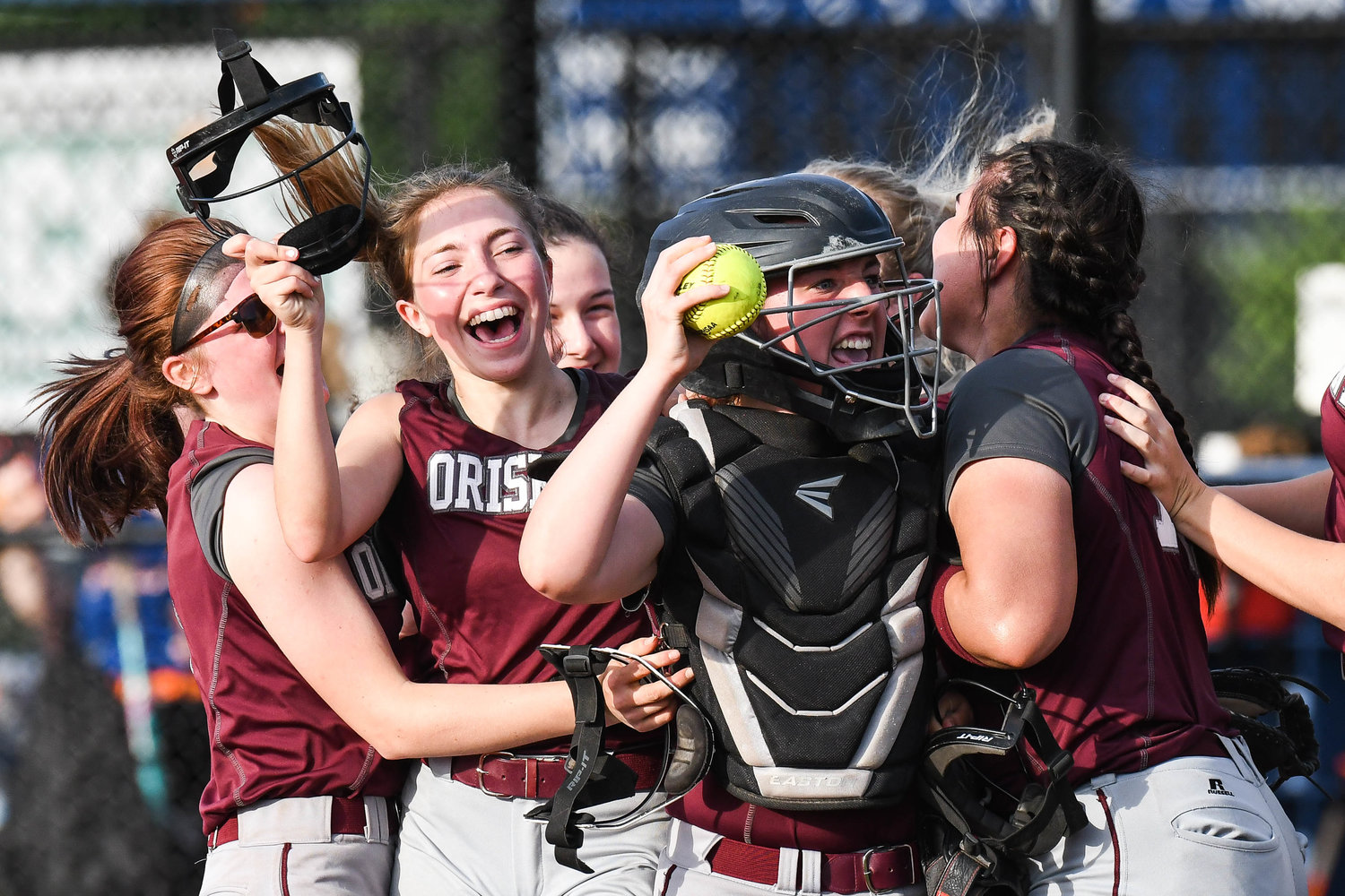 Oriskany players celebrate after beating Poland 5-4 in the Section III Class D final on Tuesday at Carrier Field in Syracuse.