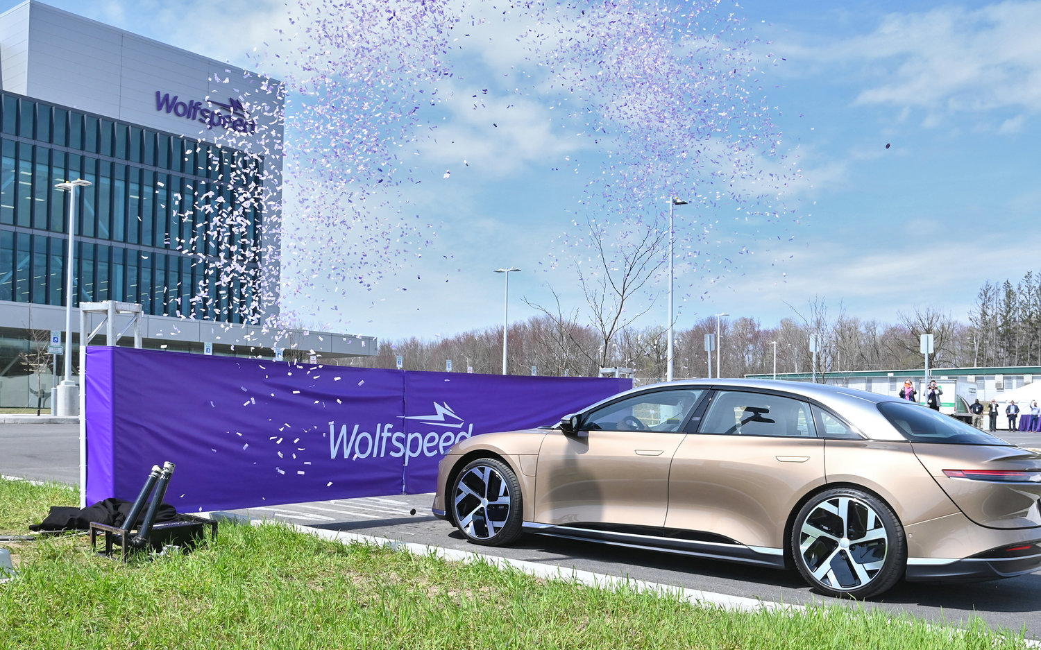 Wolfspeed celebrated their ribbon cutting ceremony on April 25 with a Lucid Motors car driving through the ribbon.