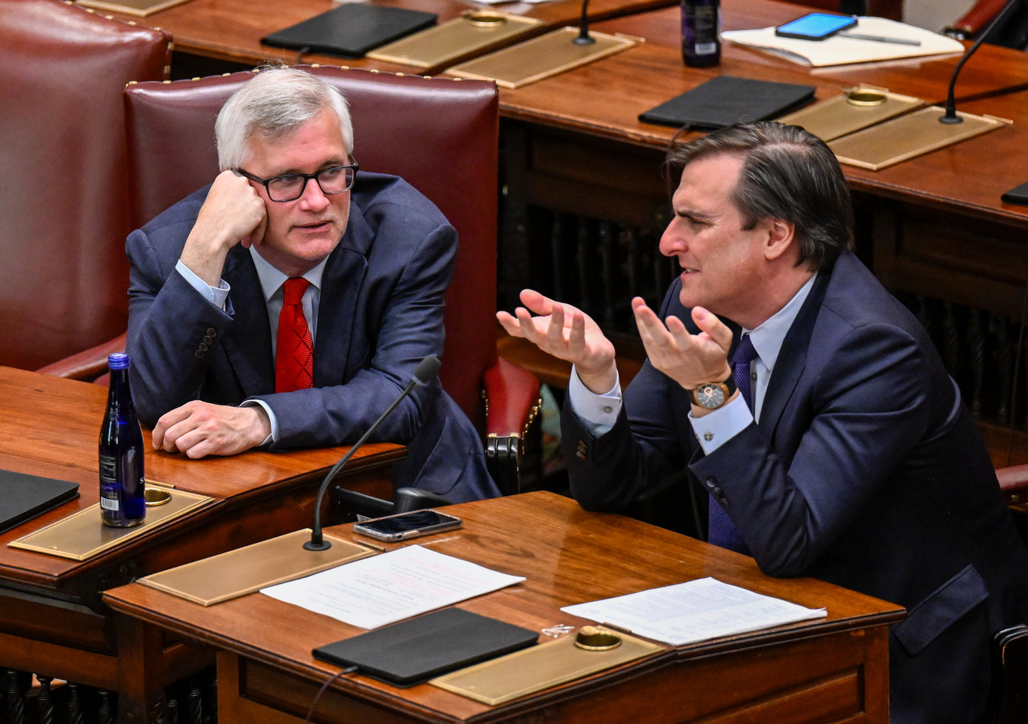 State Sen. Brian Kavanagh, D- New York, left, speaks with Senator Deputy Majority Leader, Michael Gianaris, D-Astoria, before a Senate session at the state Capitol on the last scheduled day of the 2022 legislative session, Thursday, June 2, 2022, in Albany, N.Y. (AP Photo/Hans Pennink)