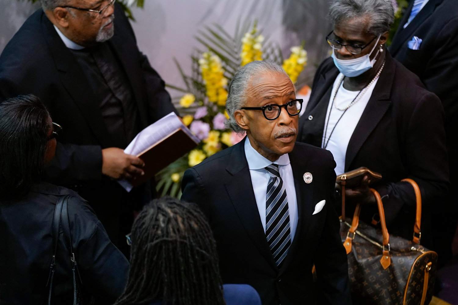 The Rev. Al Sharpton arrives for a memorial service for Ruth Whitfield, a victim of the Buffalo supermarket shooting, at Mt. Olive Baptist Church with Vice President Kamala Harris in attendance, Saturday, May 28, 2022, in Buffalo, N.Y.