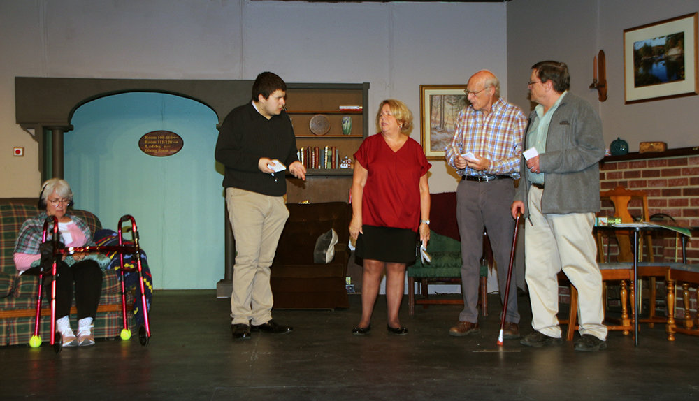 Members of the cast of Geezers rehearse their lines recently. From left: Michele Buday, Joshua Thompson, Denise Morganti, Bill Moore, and Mike Cosgrove.