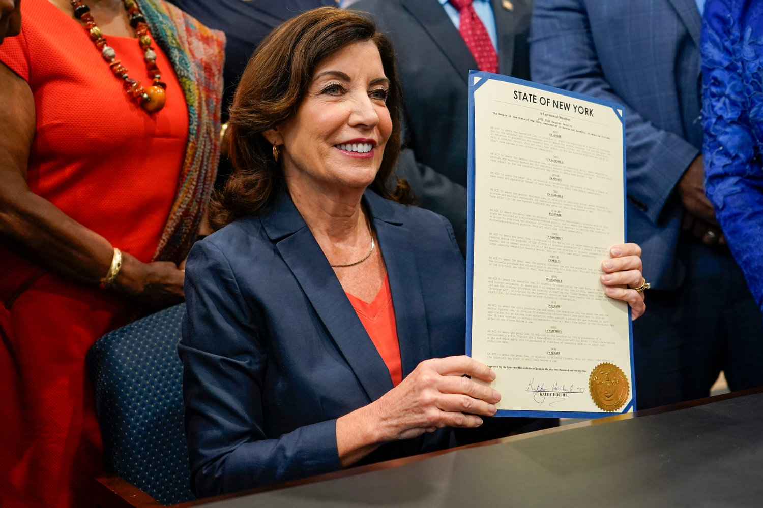 New York Gov. Kathy Hochul poses for photographers after signing a package of bills to strengthen gun laws, Monday, June 6, 2022, in New York.