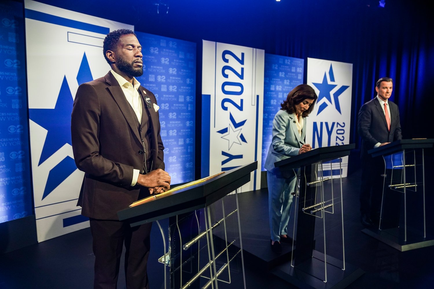 New York Public Advocate Jumaane Williams, left, New York Governor Kathy Hochul, center, Congressman Tom Suozzi, D-N.Y., prepare to face off during New York's governor primary debate at the studios of WCBS2-TV, Tuesday, June 7, 2022, in New York. (AP Photo/Bebeto Matthews)