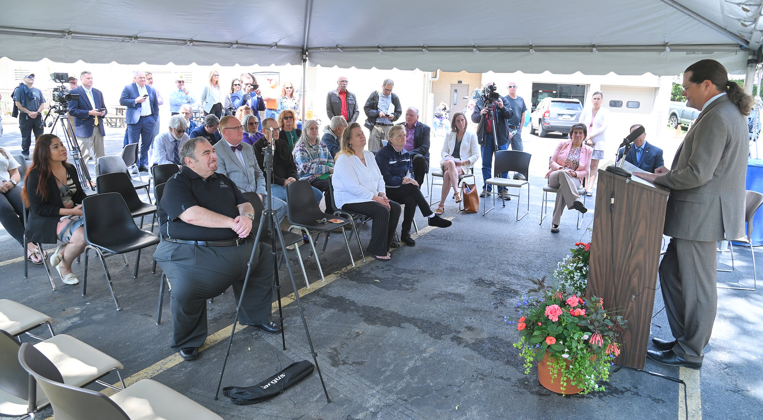 Upstate East Director of Development at NYS Homes and Community Renewal Darren Scott speaks about the Colonial II project during a ceremony to mark the start of the project in Rome on Wednesday.