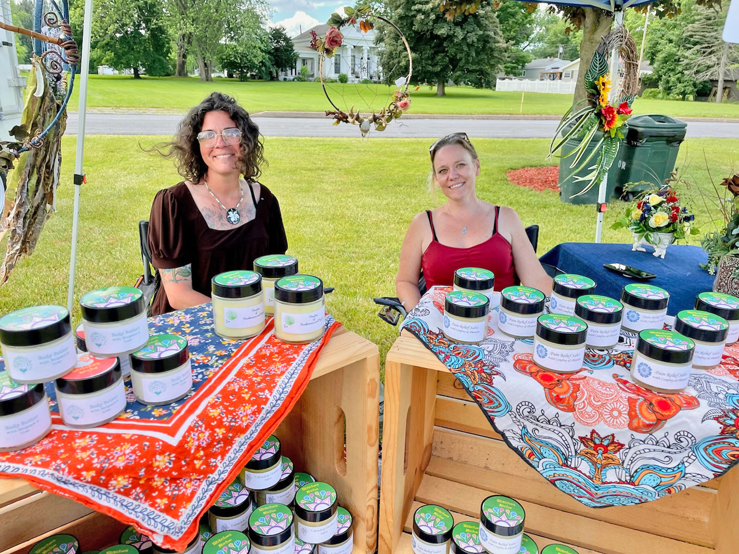 Danielle Magnitzky, left, of Forestport, and friend Kelly Fletcher, of Deerfield, of Stitches Niche, are ready to sell body butters, pain relievers, dream catchers and an assortment of crafts items at the first Oriskany Farmers Market Wednesday.