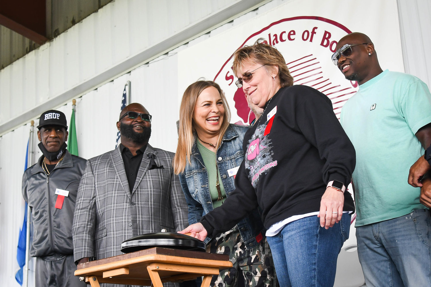 From left, International Boxing Hall of Fame inductees Michael Spinks, James Toney, Antonio Tarver look on as Regina Halmich interacts with Christy Martin while she rings the opening day bell to start the hall's Weekend Induction Trilogy on Thursday in Canastota. There are events throughout the weekend as the Hall of Fame inducts a slew of boxing legends.