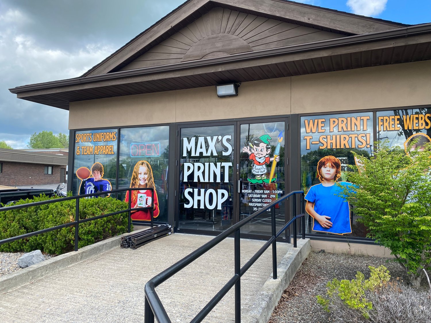 Max’s Print Shop, now located at 9555 River Road in Marcy, held a grand opening of its new site on Friday, featuring a car show, entertainment and a view of its larger facility.