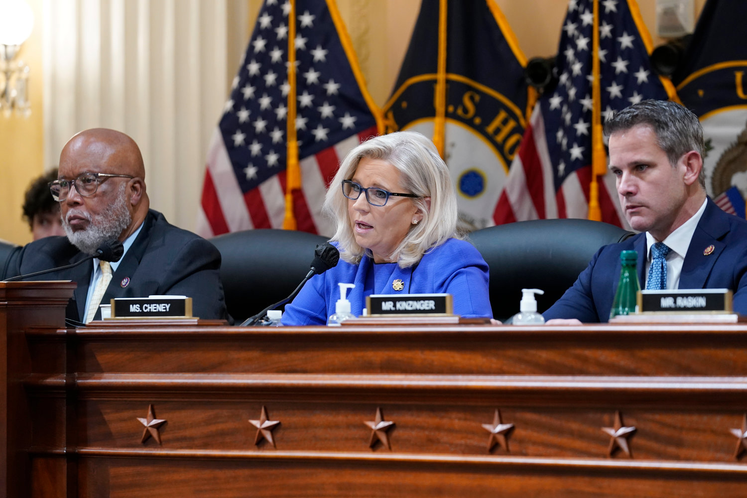 Vice Chair Liz Cheney, R-Wyo., gives her opening remarks as Committee Chairman Rep. Bennie Thompson, D-Miss., left, and Rep. Adam Kinzinger, R-Ill., look on, as the House select committee investigating the Jan. 6 attack on the U.S. Capitol holds its first public hearing to reveal the findings of a year-long investigation, at the Capitol in Washington, Thursday, June 9, 2022. (AP Photo/J. Scott Applewhite)