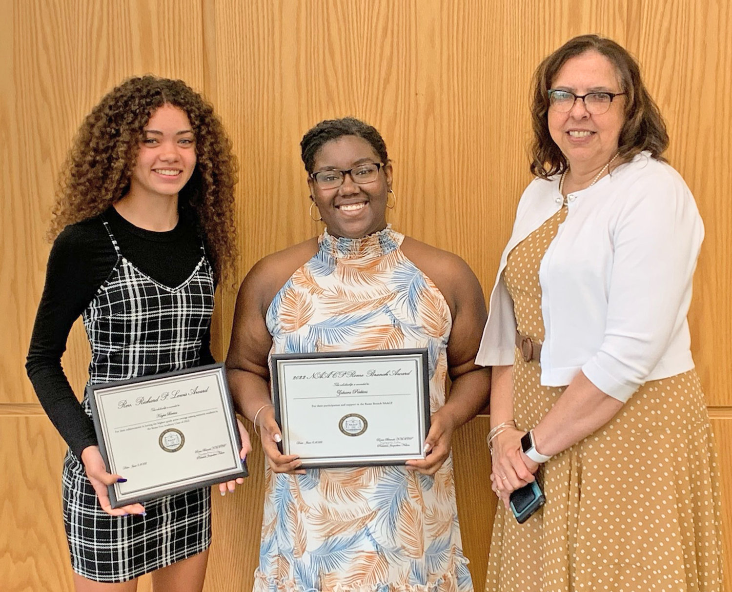 Kaylee Bertini, left, receives the Rev. Richard P. Lewis Award and $500, while Zahara Perkins, center, receives the 2022 Rome NAACP Award and $500. The graduating seniors are shown with Jacqueline Nelson, president of the Rome Branch NAACP and Western Region education chair.