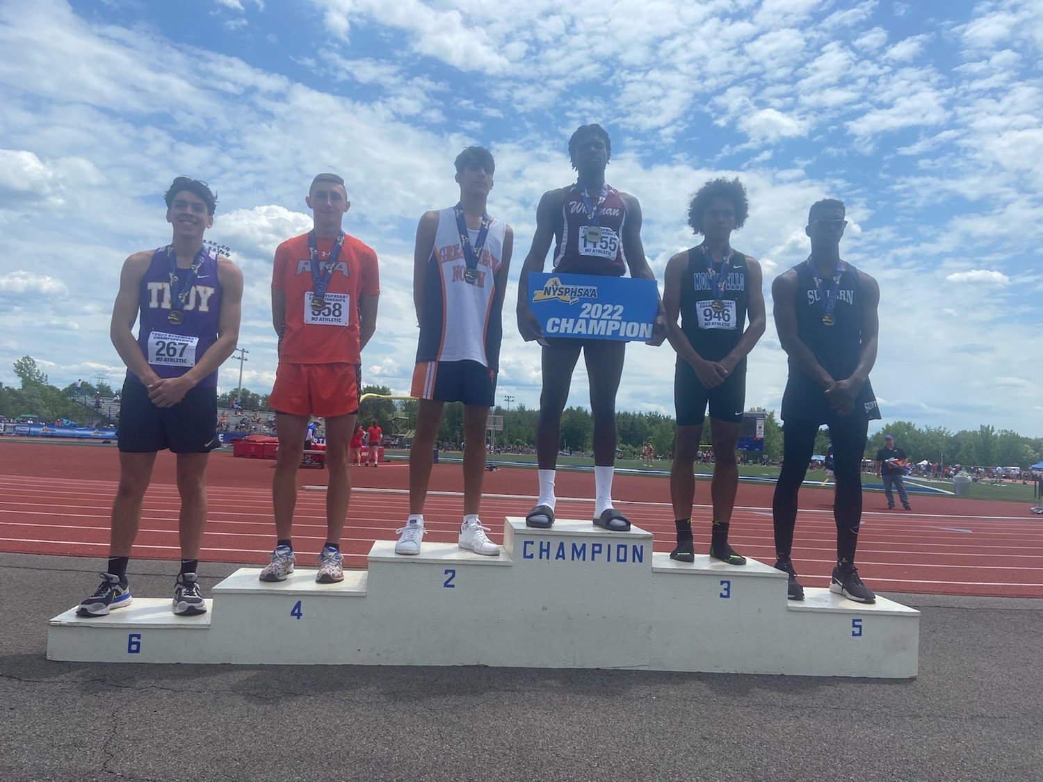 Rome Free Academy senior Edward Rakowski, second from left, was fourth in the state and fifth in Federations in high jump in the event at Cicero-North Syracuse High School.
