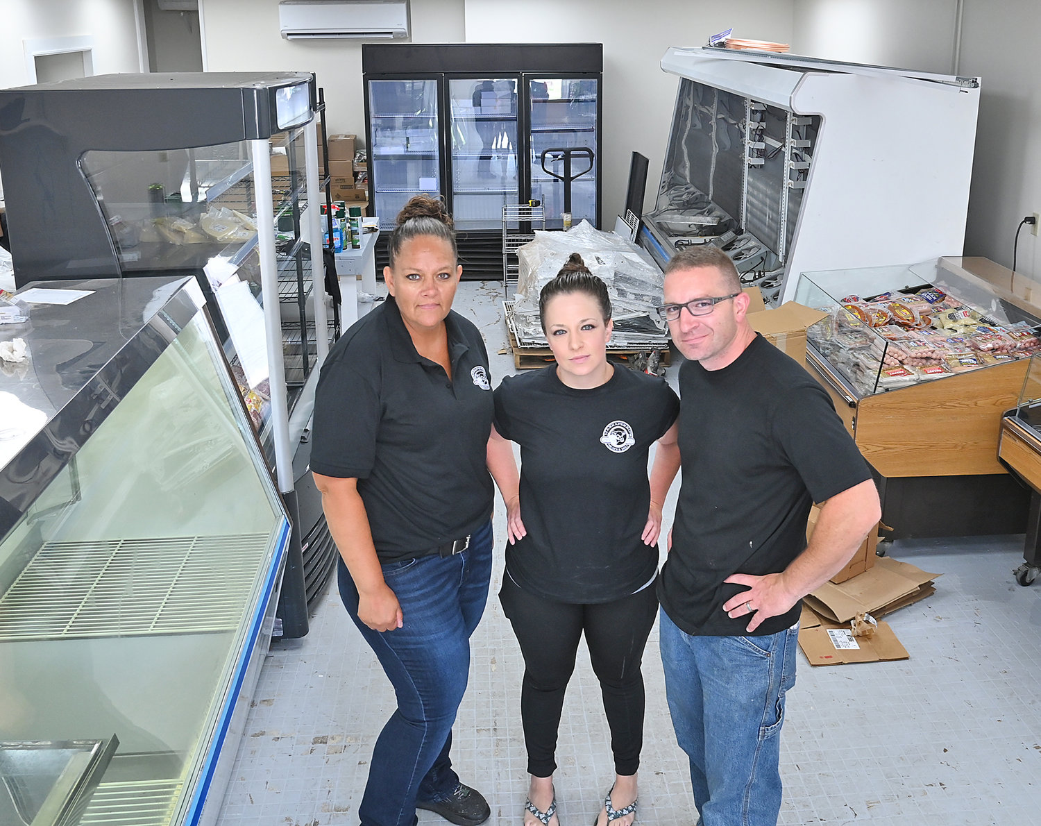 Mazzaferro’s Meats & Deli will open a satellite location on Railroad Street in Rome next week, featuring the talents of, from left, Missy Roberts, cook; Sabrina Davis, manager; and Brandon Ferrare, butcher.