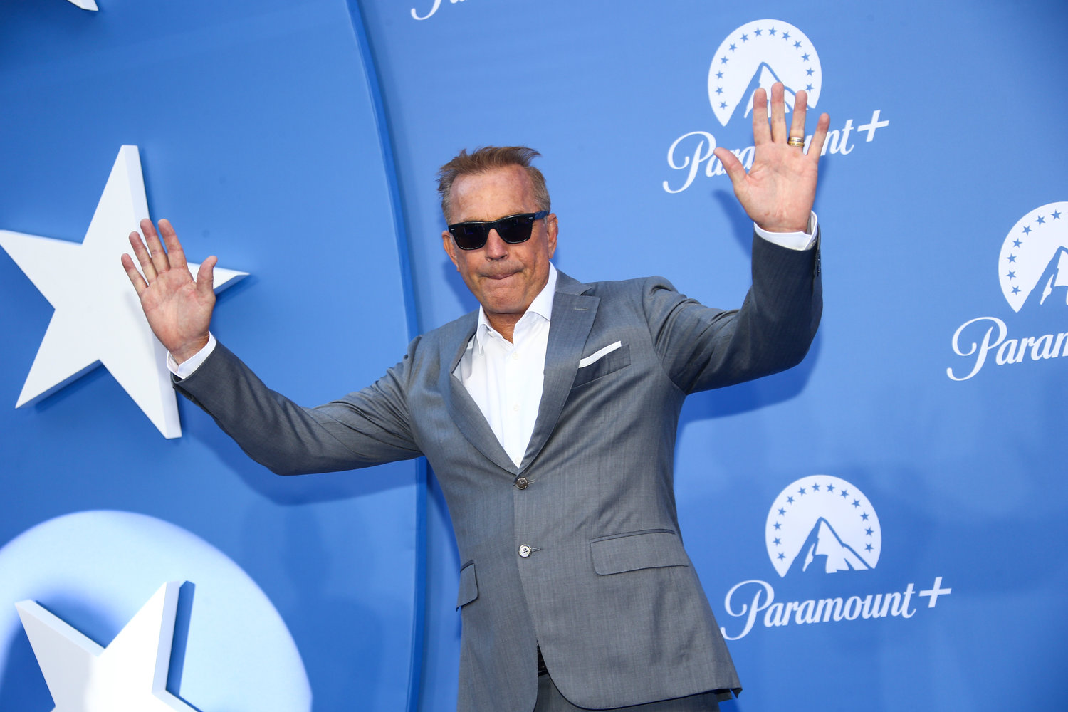Kevin Costner greets the press as he arrives for the UK launch of the streaming site Paramount +, in London.