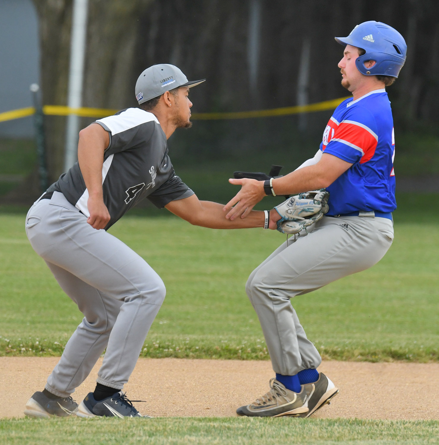 Sherrill Silversmiths shortstop Jaylon Nauden tags out Hornell Steamers baserunner Paxton Hughes in a failed steal attempt in Tuesday’s game. Sherrill won 9-2 at home and Nauden had a hit and scored a run.
