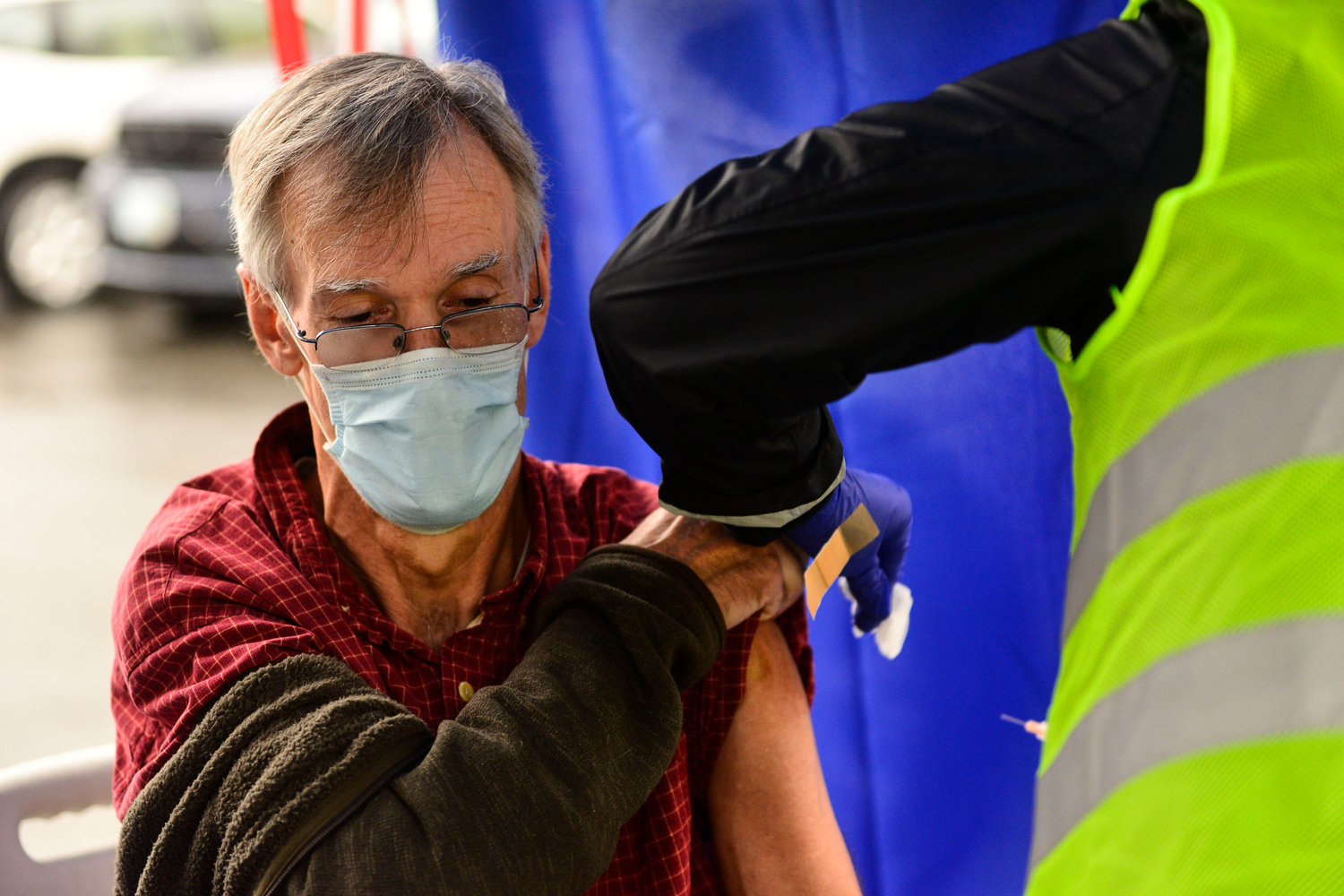 FILE - Crager Boardman, from Brattleboro, Vt., receives a shot at a flu vaccine clinic in Brattleboro on Tuesday, Oct. 26, 2021. On Wednesday, June 22, 2022, a federal advisory panel says Americans 65 and older should get newer, souped-up flu vaccines. The panel unanimously recommended certain flu vaccines for seniors, whose weakened immune systems don‚Äôt respond as well to traditional shots. (Kristopher Radder/The Brattleboro Reformer via AP, File)