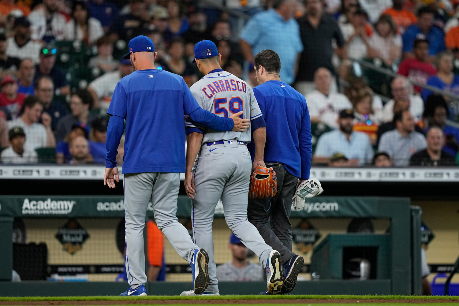New York Mets starting pitcher Carlos Carrasco (59) leaves the field during the third inning of a game against the Houston Astros on Wednesday afternoon in Houston. The Mets lost 5-3.