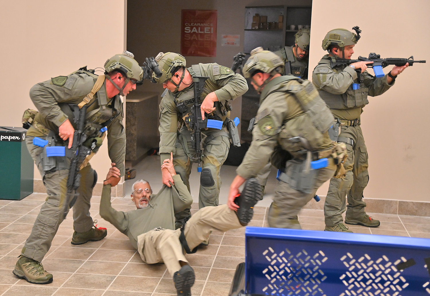 The SWAT team from the Orange County Sheriff’s Office removes a victim from an active shooter scenario at the New York State Preparedness Training Center in Whitestown.