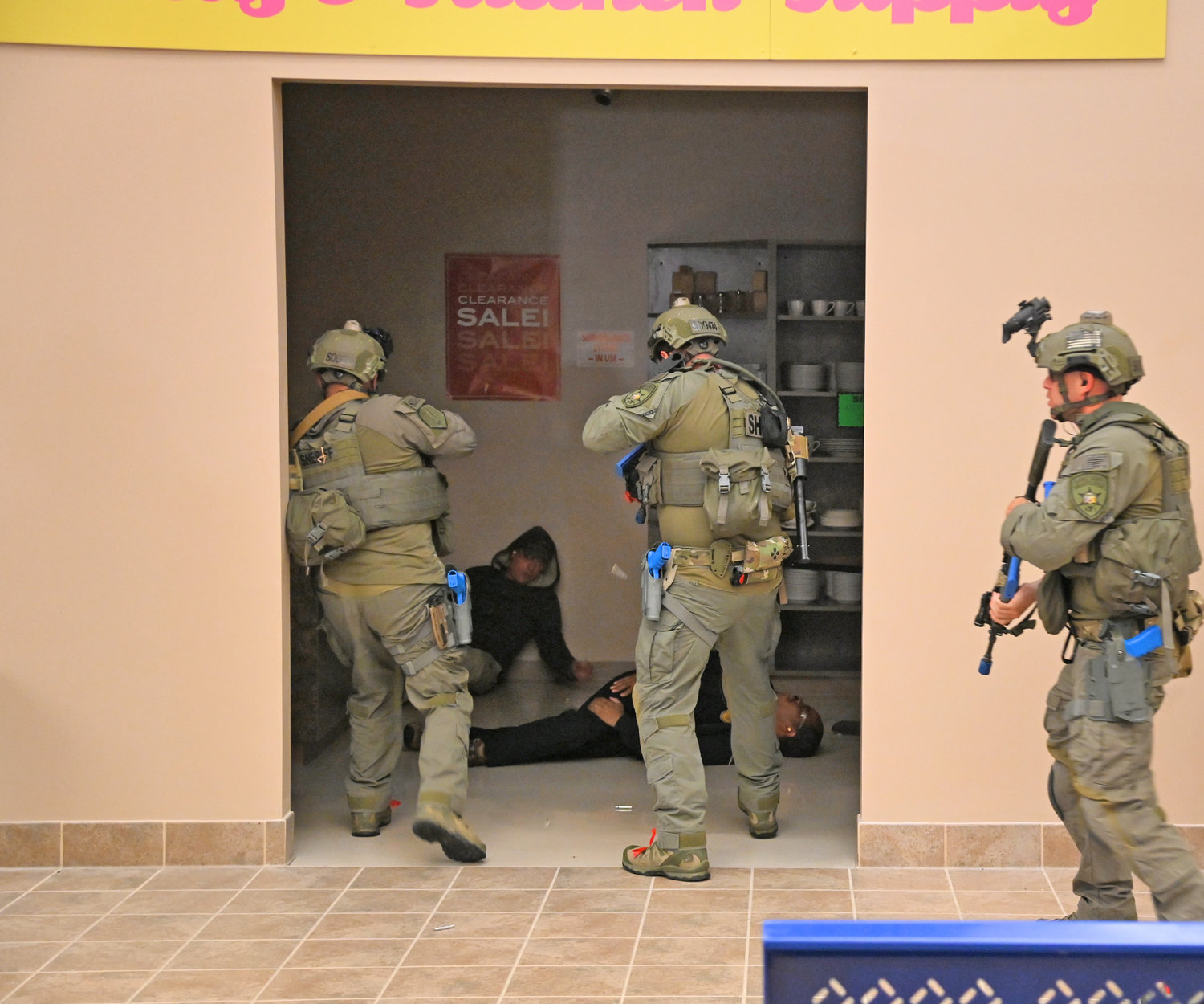 The shooter in an active training scenario is cornered and gunned down by members of the Orange County Sheriff's Office on Thursday at the New York State Preparedness Training Center in Whitestown. The scenario took place in a makeshift mall.