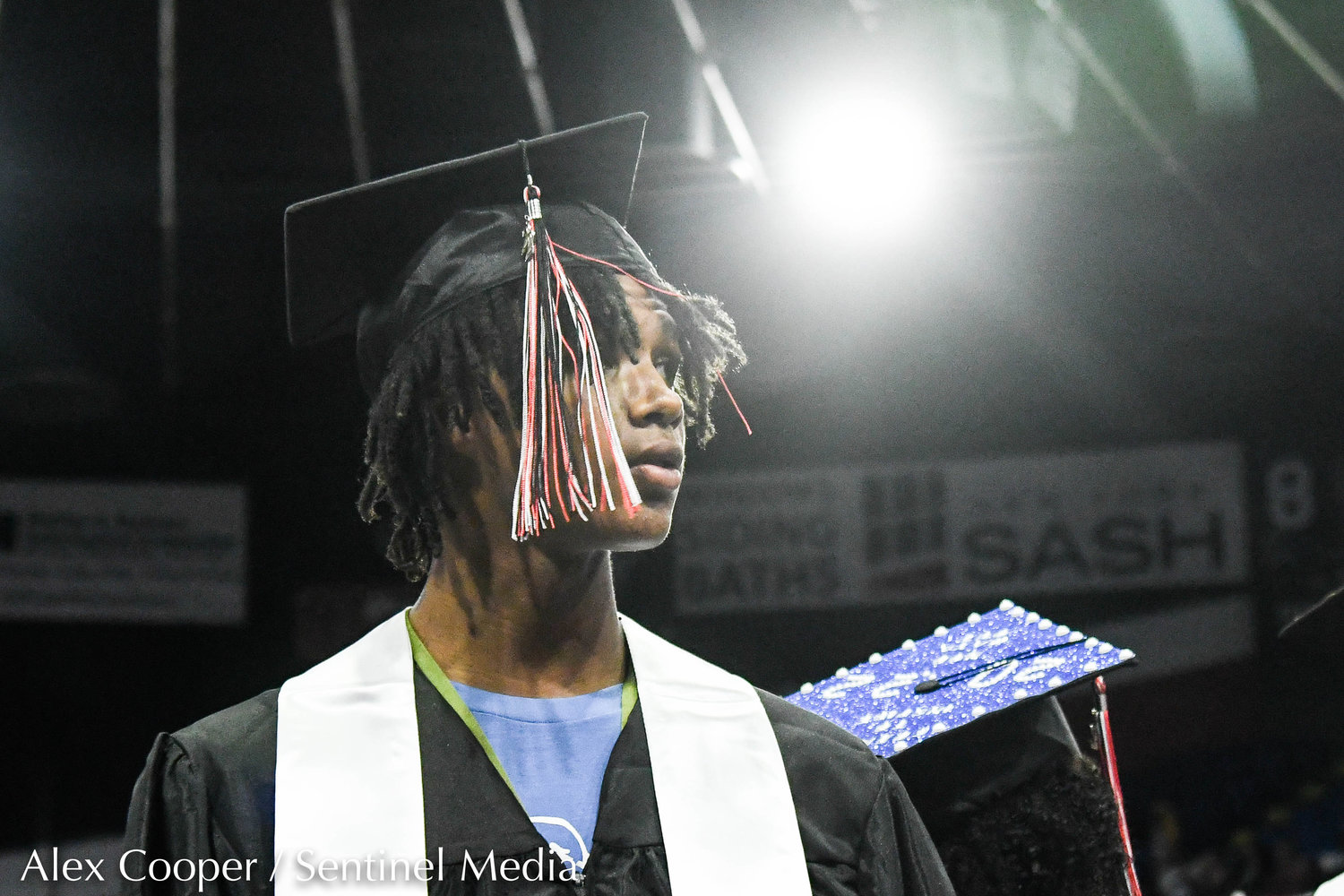 Graduate Deshawn Carter looks out onto the crowd during the annual commencement ceremony for Thomas R. Proctor High School on Friday at the Adirondack Bank Center at the Utica Memorial Auditorium.
