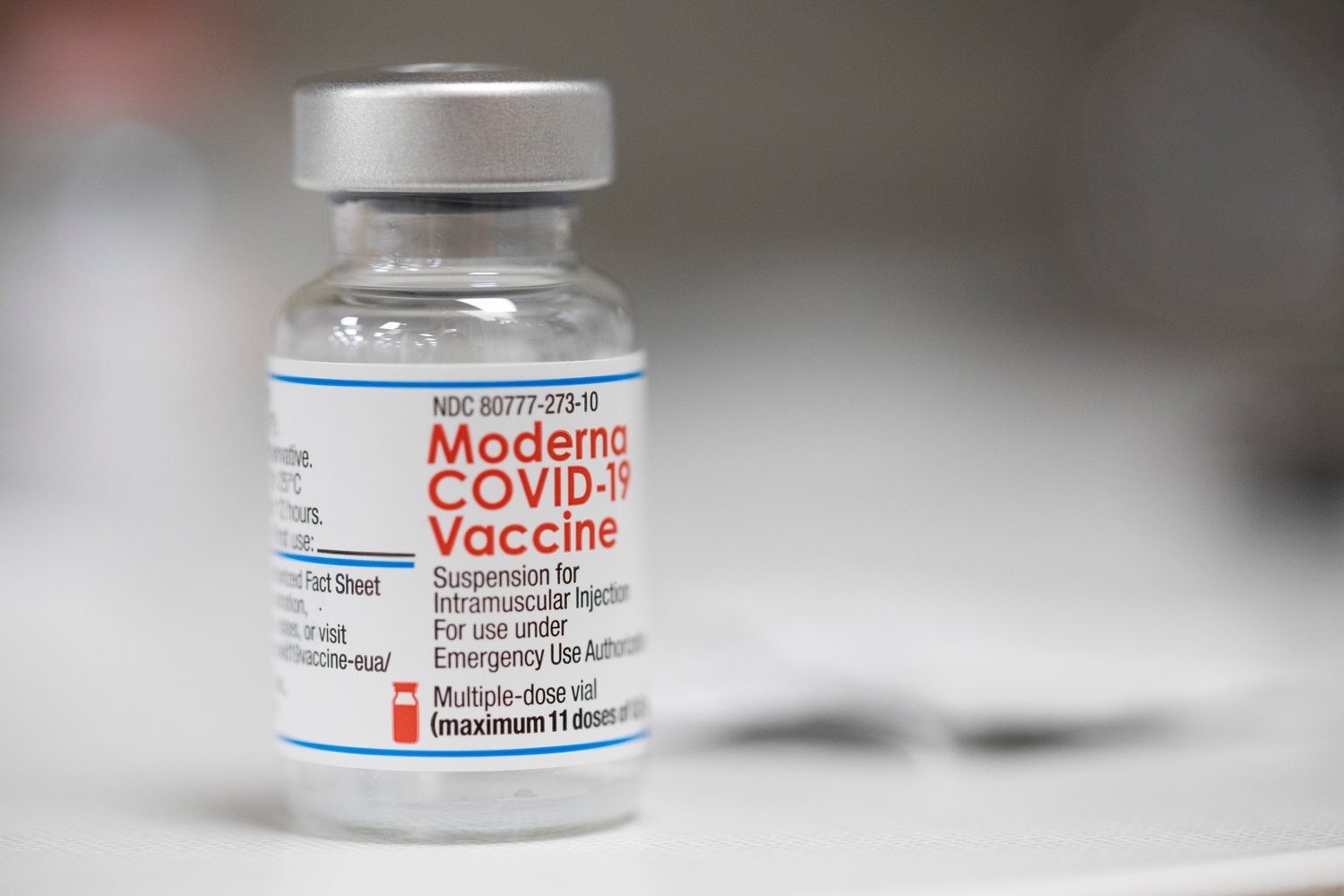 FILE - A vial of the Moderna COVID-19 vaccine is displayed on a counter at a pharmacy in Portland, Ore. on Dec. 27, 2021. U.S. health authorities are facing a critical decision: whether to offer COVID-19 booster shots this fall that better match the omicron variant even though the coronavirus already has spawned still more mutants. Moderna and Pfizer are testing updated booster candidates, and advisers to the U.S. Food and Drug Administration will debate Tuesday, June 28, 2022, if it‚Äôs time for a switch, setting the stage for similar moves by other countries. (AP Photo/Jenny Kane, File)