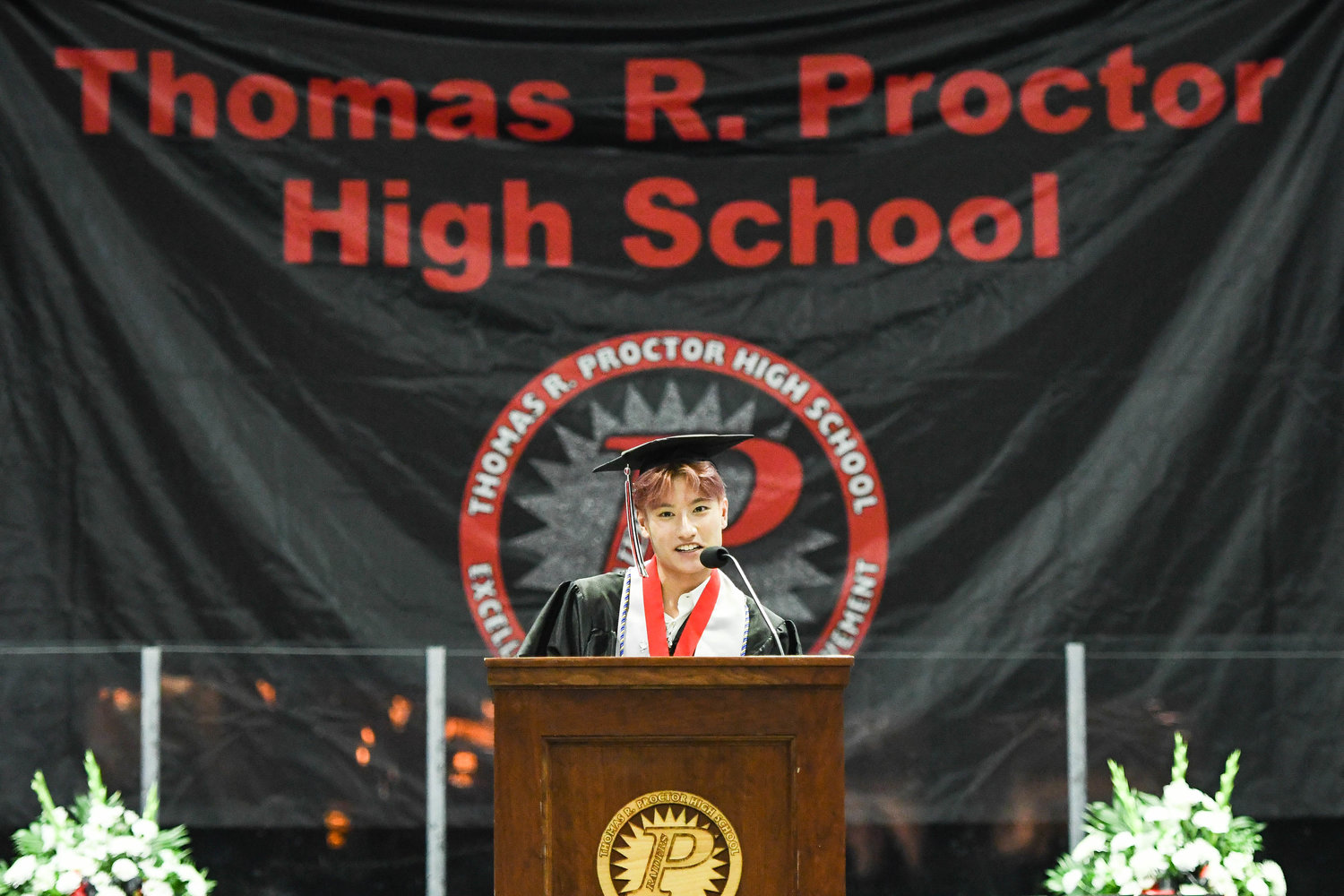 Valedictorian John Nguyen speaks during the annual commencement ceremony for Thomas R. Proctor High School on Friday at the Adirondack Bank Center at the Utica Memorial Auditorium.