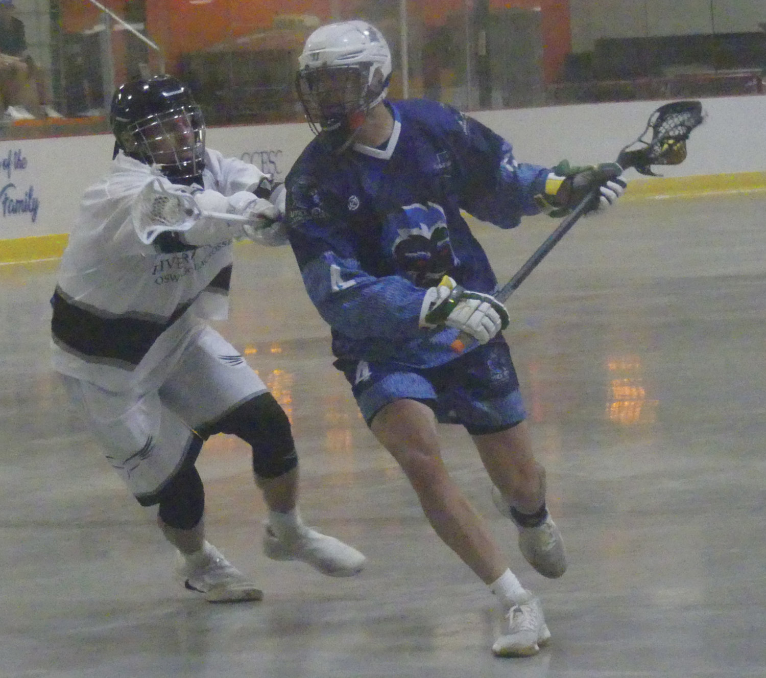 Utica’s Nick Suits finds space against Oswego on Friday night in a box lacrosse game at Kennedy Arena in Rome. Suits, the former New Hartford standout, had three goals and an assist in Utica’s lopsided victory.