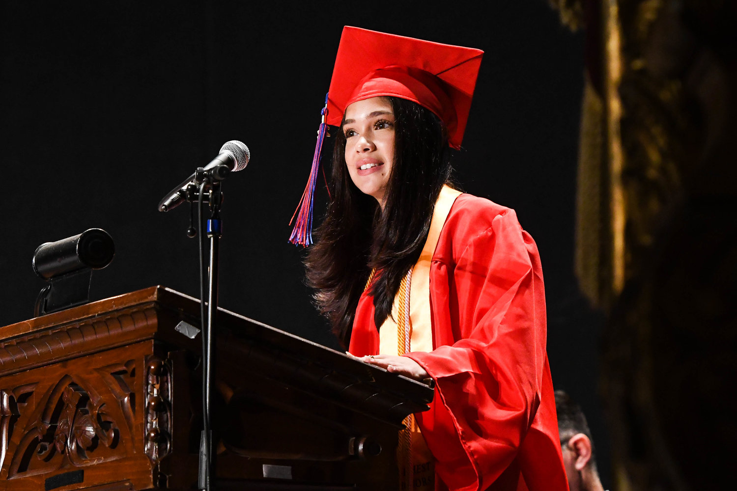 New Hartford graduate Francesca Azzarito speaks during the annual commencement ceremony for New Hartford High School on Saturday at The Stanley Theatre in Utica.