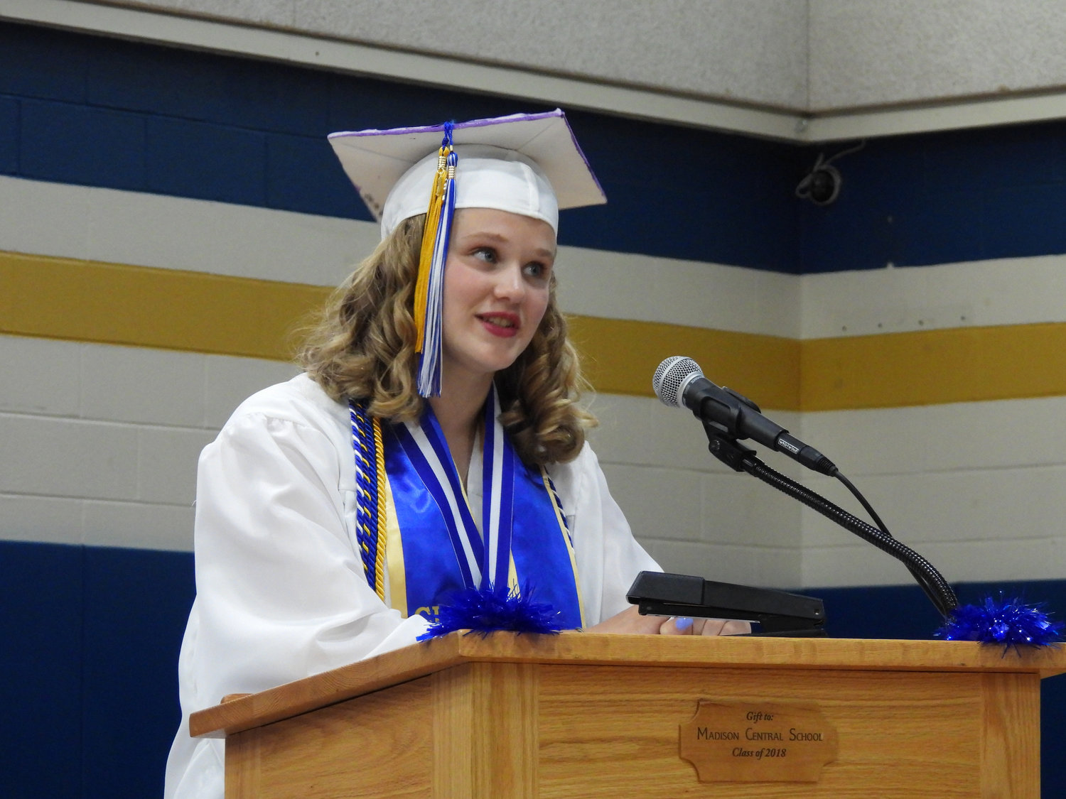 Madison Central's Class of 2022 start the next chapter of their lives, doffing their caps and celebrating their graduation on Friday, June 24. Pictured is Valedictorian Anna McNamara, speaking to the graduating class