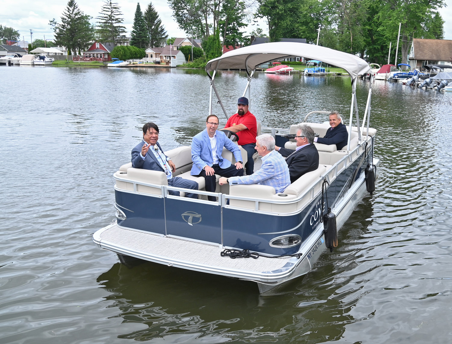 Officials including Oneida Indian Nation Representative Ray Halbritter; State Sen. Joseph A. Griffo, R-47, Rome; and Oneida County Executive Anthony J. Picente Jr., arrive for the grand opening ceremony for ‘The Cove’ in Sylvan Beach Tuesday morning.