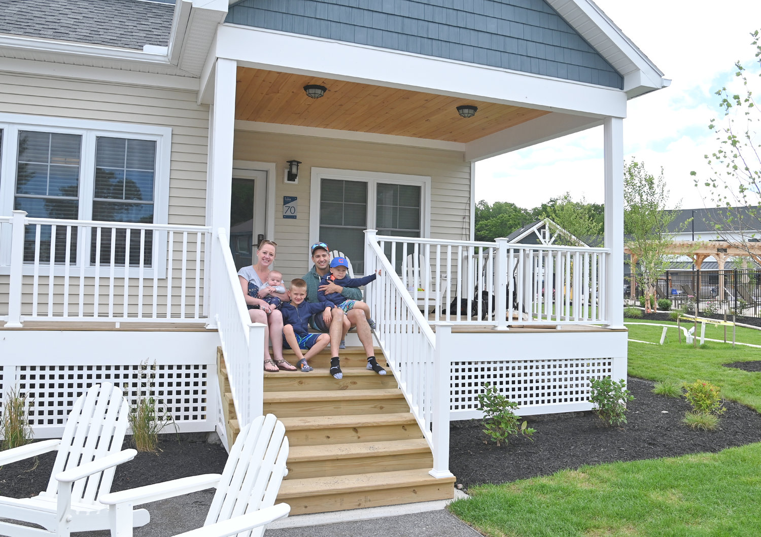 The Barry Family- Left to right- Aileen holding 4-month-old Evan; Dean, 7, and Scott holding Owen, 4. They were the first ones to rent a cottage at The Cove and they are from New Jersey.
