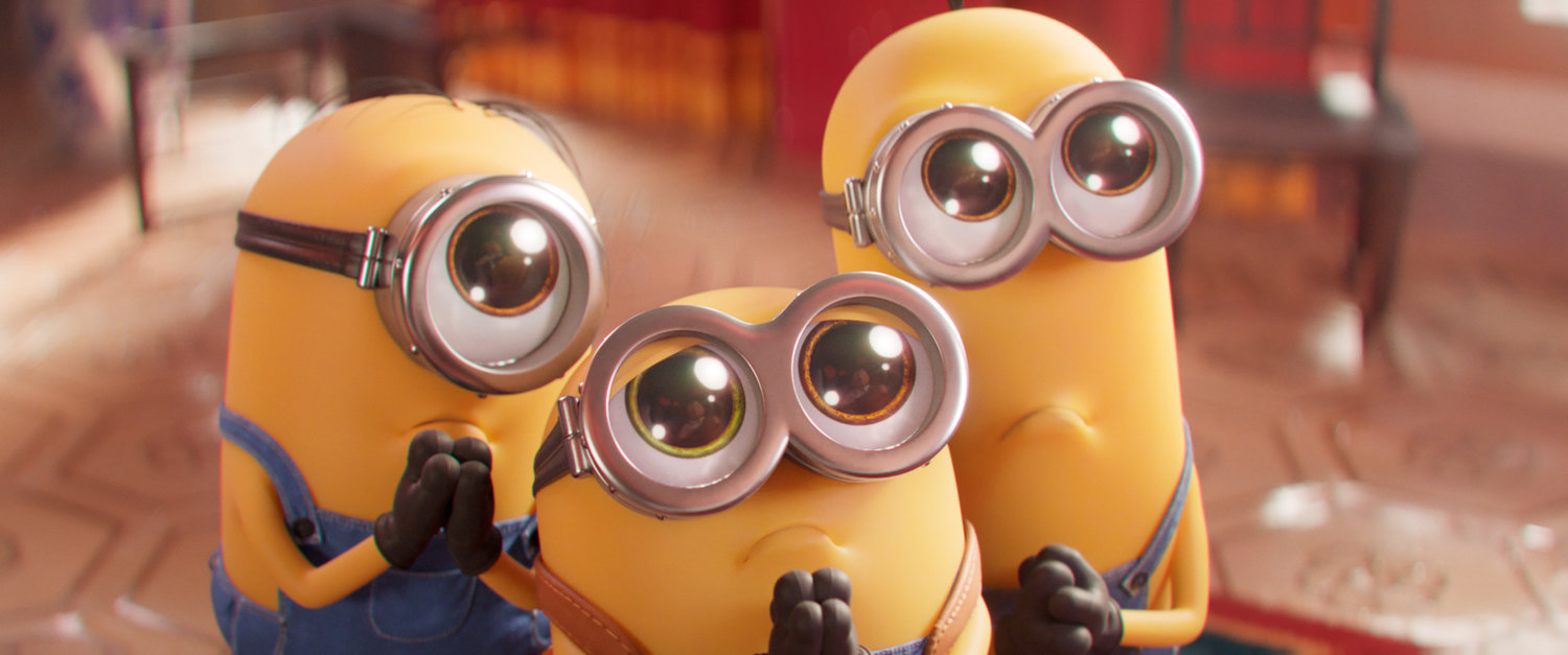 This image released by Universal Pictures shows Minions characters, from left, Stuart, Bob and Kevin in a scene from "Minions: The Rise of Gru."