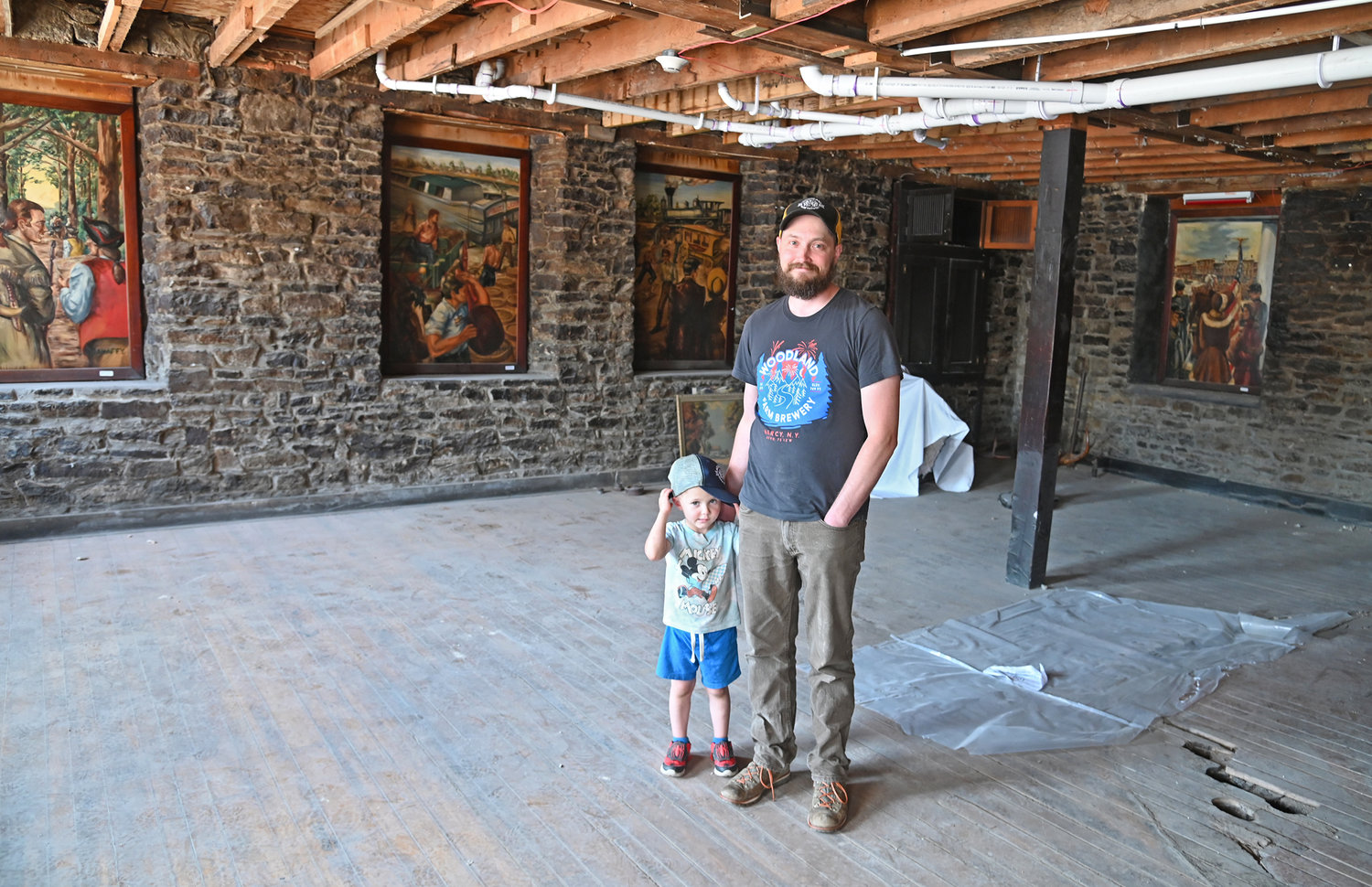 Keith Redhead with his son, Carl, at the new tap room space on the first floor of the Hulbert House in Boonville.