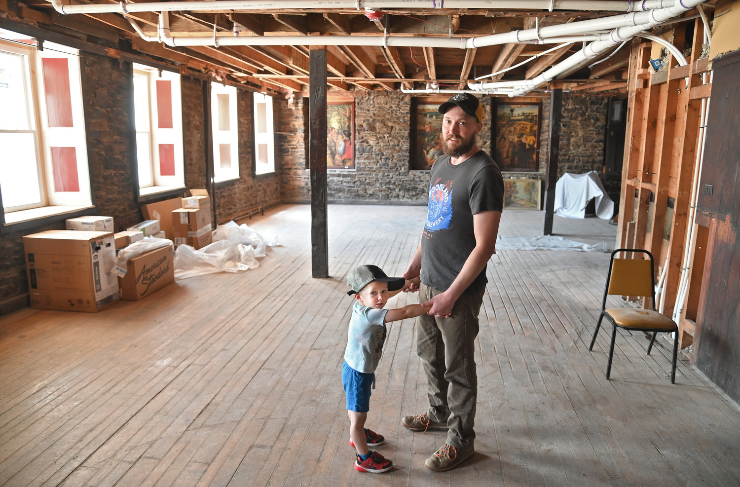 Keith Redhead pictured with his son Carl at the new tap room space on the first floor of the Hulbert House.