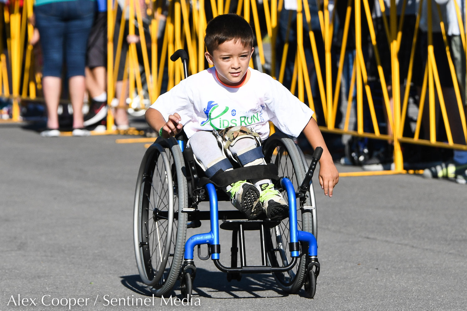 A young boy participates in the Utica National Kids Run at Mohawk Valley Community College in Utica on Saturday.