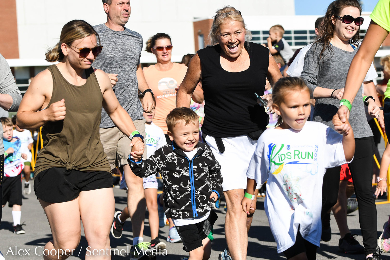 Children and their loved ones participate in the Utica National Kids Run at Mohawk Valley Community College in Utica on Saturday.
