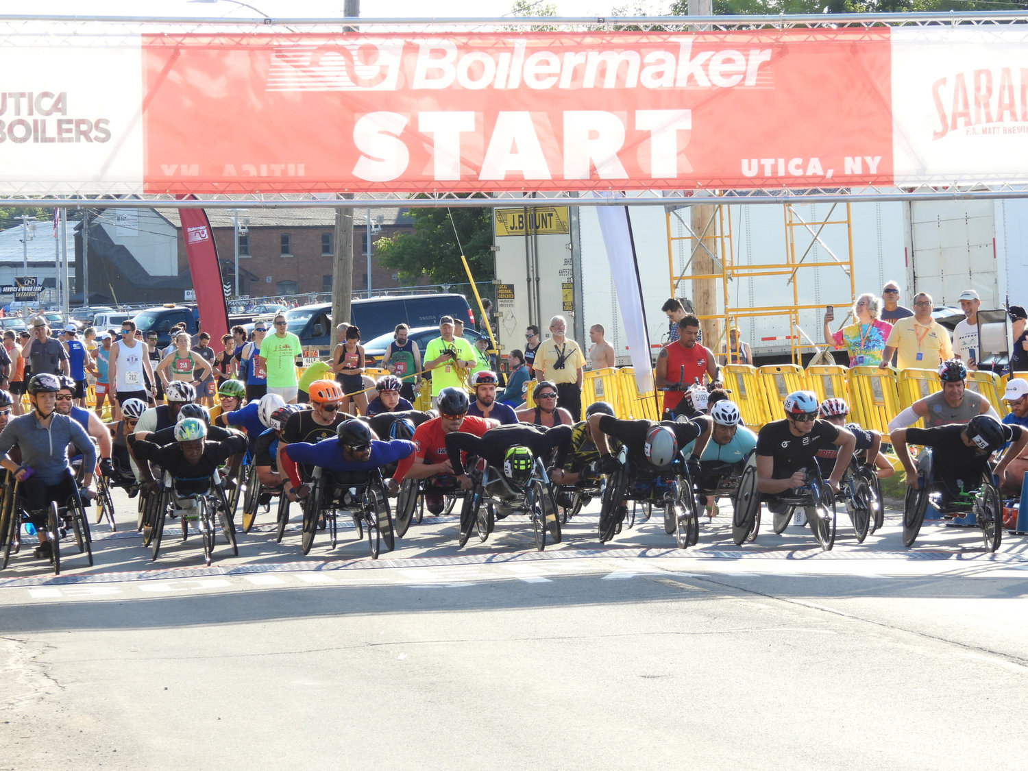 Wheelchair racers take their place for the 45th Boilermaker Road Race on Sunday, July 10 in Utica.