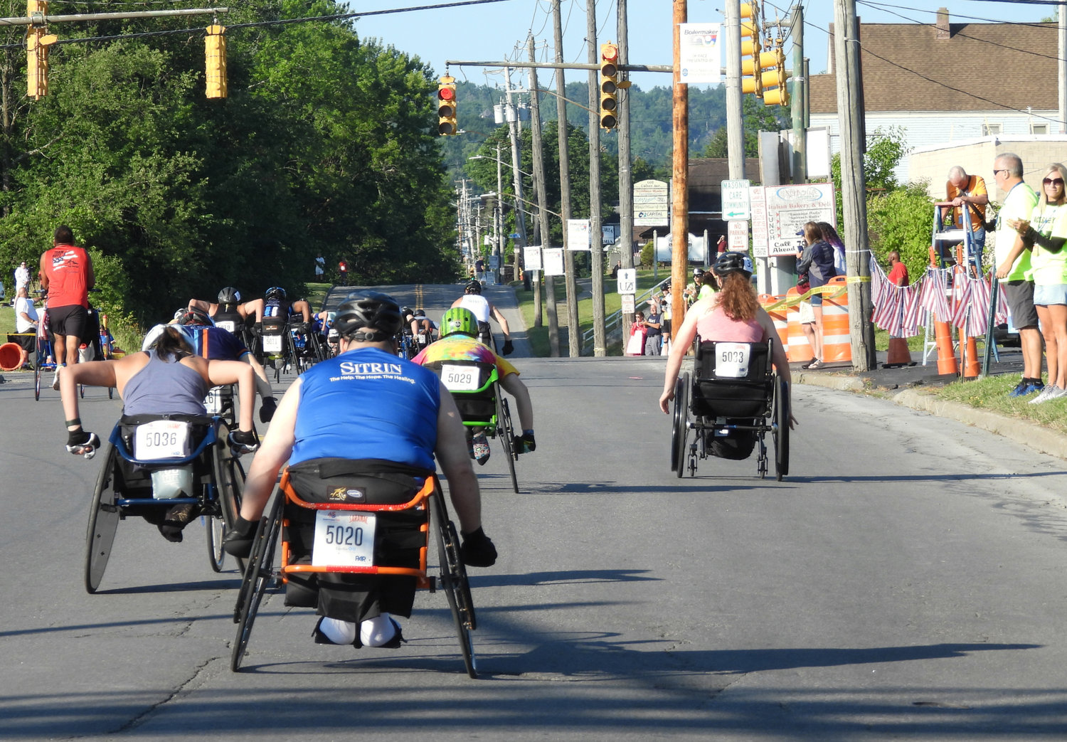 Wheelchair racers take off for the 45th Boilermaker Road Race on Sunday, July 10 in Utica.