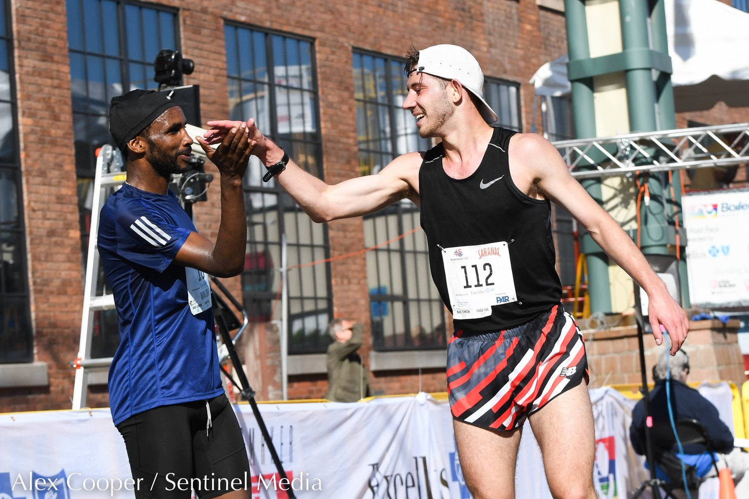 15K runners cross the finish line during the 45th Boilermaker Road Race on Sunday.