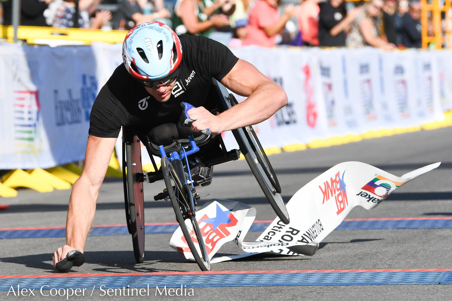 Daniel Romanchuk places first in the men's wheelchair 15K during the 45th Boilermaker Road Race on Sunday.